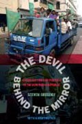 The Devil behind the Mirror - Globalization and Politics in the Dominican Republic