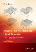 Macro- to Microscale Heat Transfer: The Lagging Behavior
