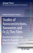Studies of nanoconstrictions, nanowires and Fe304thin films: electrical conduction and magnetic properties : fabrication by focused electron/ion beam