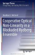 Cooperative optical non-linearity in a blockaded Rydberg ensemble